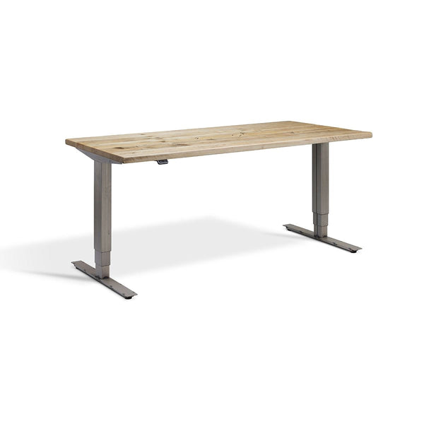 A simple, rectangular wooden standing desk with raw steel metal legs, standing alone against a white background.