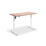 A simple, rectangular wooden desk with a minimalist design.