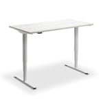 A simple, white adjustable standing desk with a minimalist design.