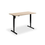 A simple, rectangular wooden desk with black metal legs.