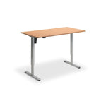 A simple, rectangular wooden desk with a metal frame, standing alone against a white background.