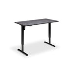 A simple, rectangular black standing desk with a flat top surface and two black metal legs.