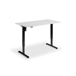 A simple, rectangular white desk with black metal legs.