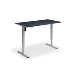 A simple, rectangular desk with a dark surface and two metal legs.