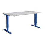 Angled front view of the Atlas Royal Blue Edition Standing Desk with pine top.