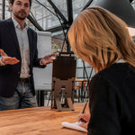 Man using the aluminium Ergo-Q Hybrid Pro Laptop and Tablet Stand.