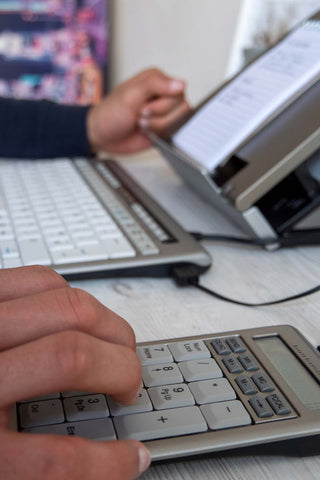 Person using 840 numeric keyboard.