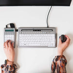 Aerial view of person using Bakker elkhuizen s board 840 numeric keyboard.