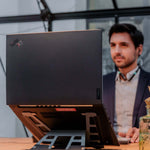 Man using Aluminium universal laptop stand.