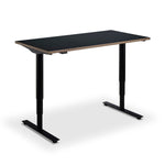 a simple, rectangular standing desk with a black top and two black metal legs.