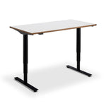 A simple, rectangular desk with a white top and black metal legs.