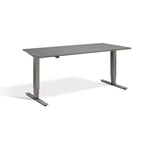 A gray adjustable standing desk with a minimalist design.