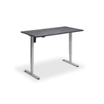 A simple, rectangular standing desk with a dark wood grain top and silver metal legs.