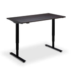 a simple, rectangular wooden desk with a dark finish.