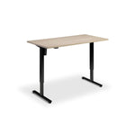 A simple, rectangular wooden desk with black metal legs.