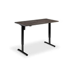 A simple, rectangular desk with a dark finish and black metal legs.