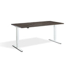 a modern, rectangular desk with a dark wood top and white metal legs.