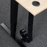 cable spine attached to standing desk.