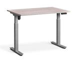 adjustable single-motor standing desk with white top and silver legs
