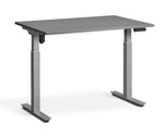 adjustable single-motor standing desk with grey top and silver legs