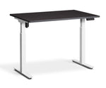 adjustable single-motor standing desk with black top and white legs
