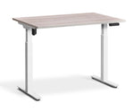 adjustable single-motor standing desk with white top and white legs